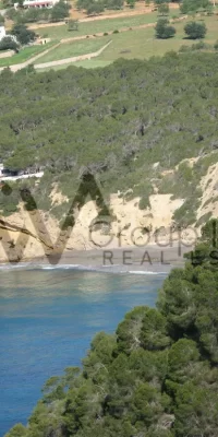 Squisita tenuta di lusso con tre ville e accesso diretto al mare a Cala Boix, San Carlos